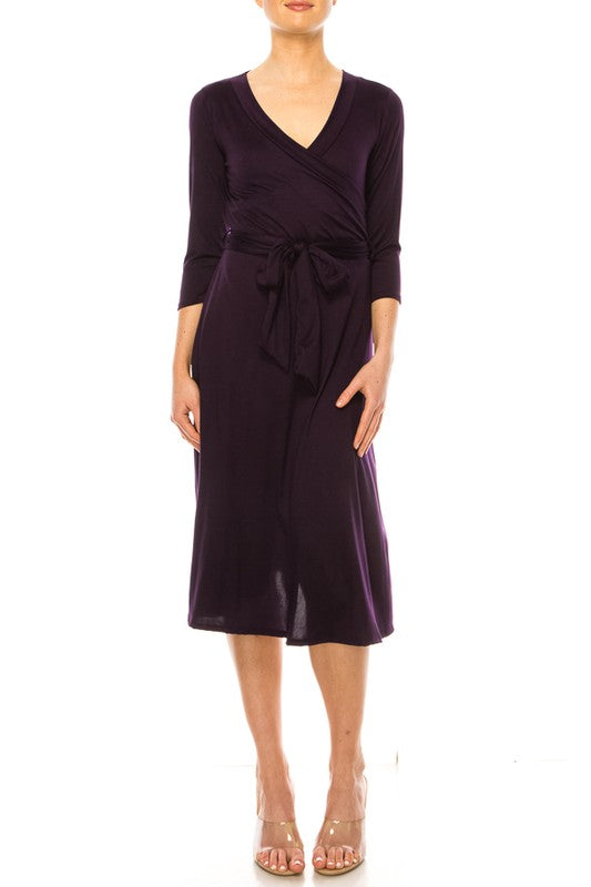 Solid faux wrap dress with deep V-neck