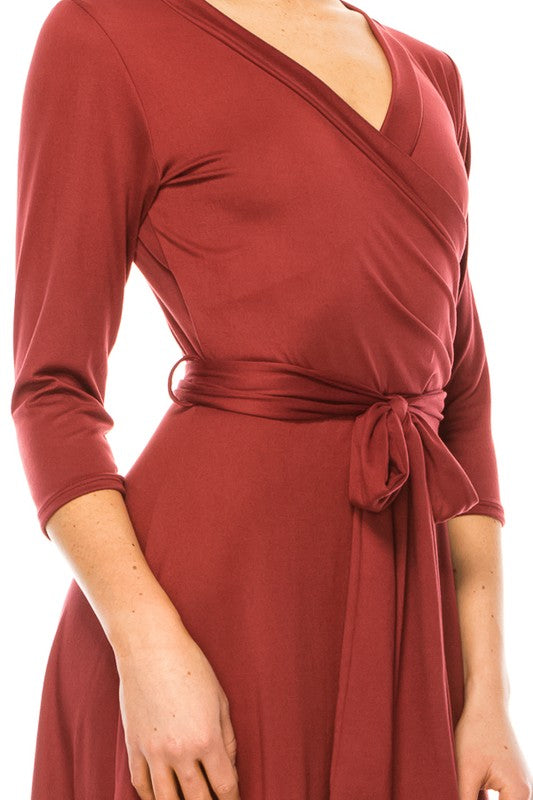 Solid faux wrap dress with deep V-neck