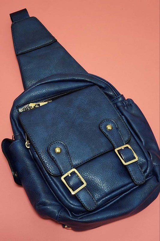 TWO STRAP DETAIL FRONT VEGAN LEATHER SLING BAGS